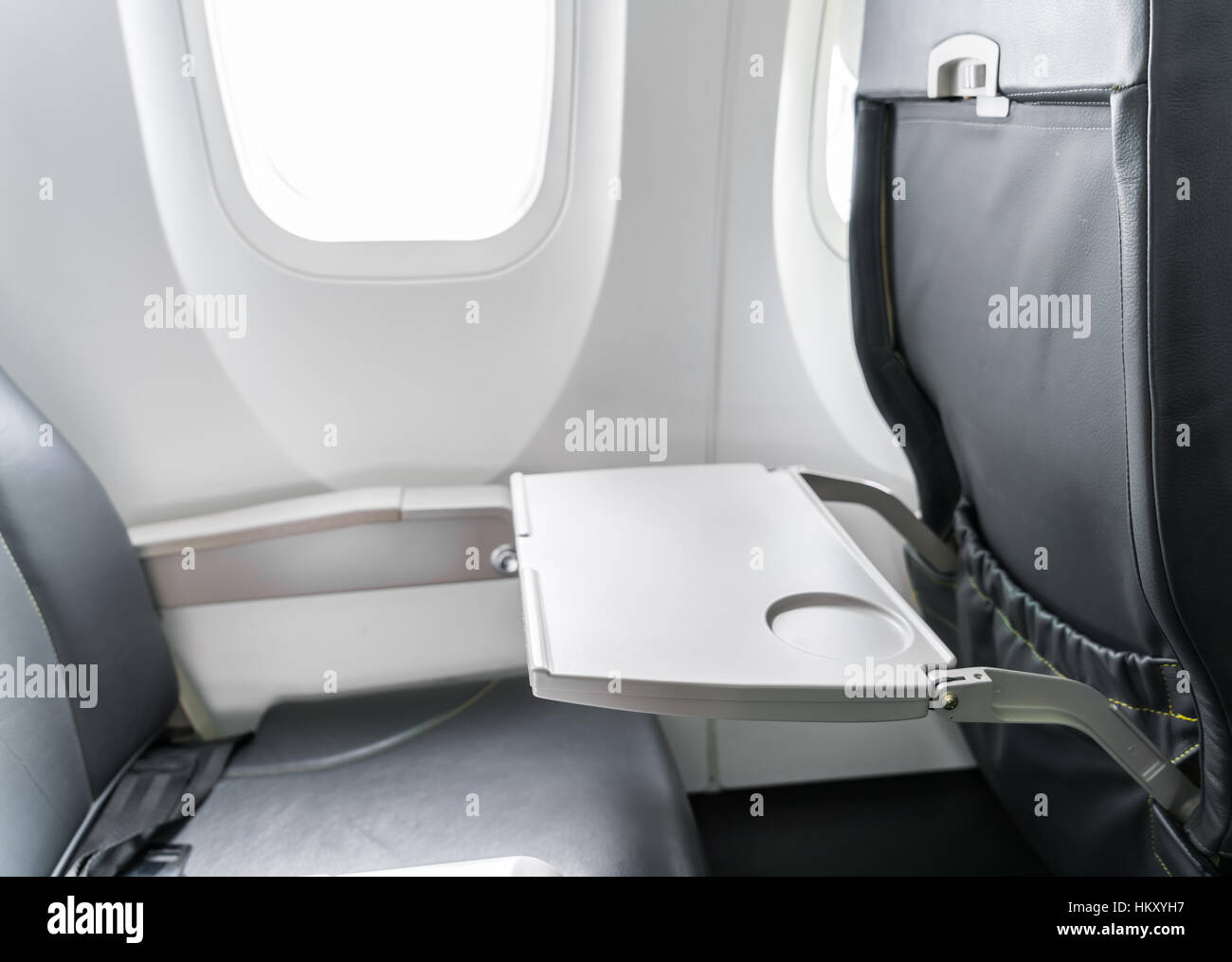 Airplane tray table on seat back Stock Photo Alamy