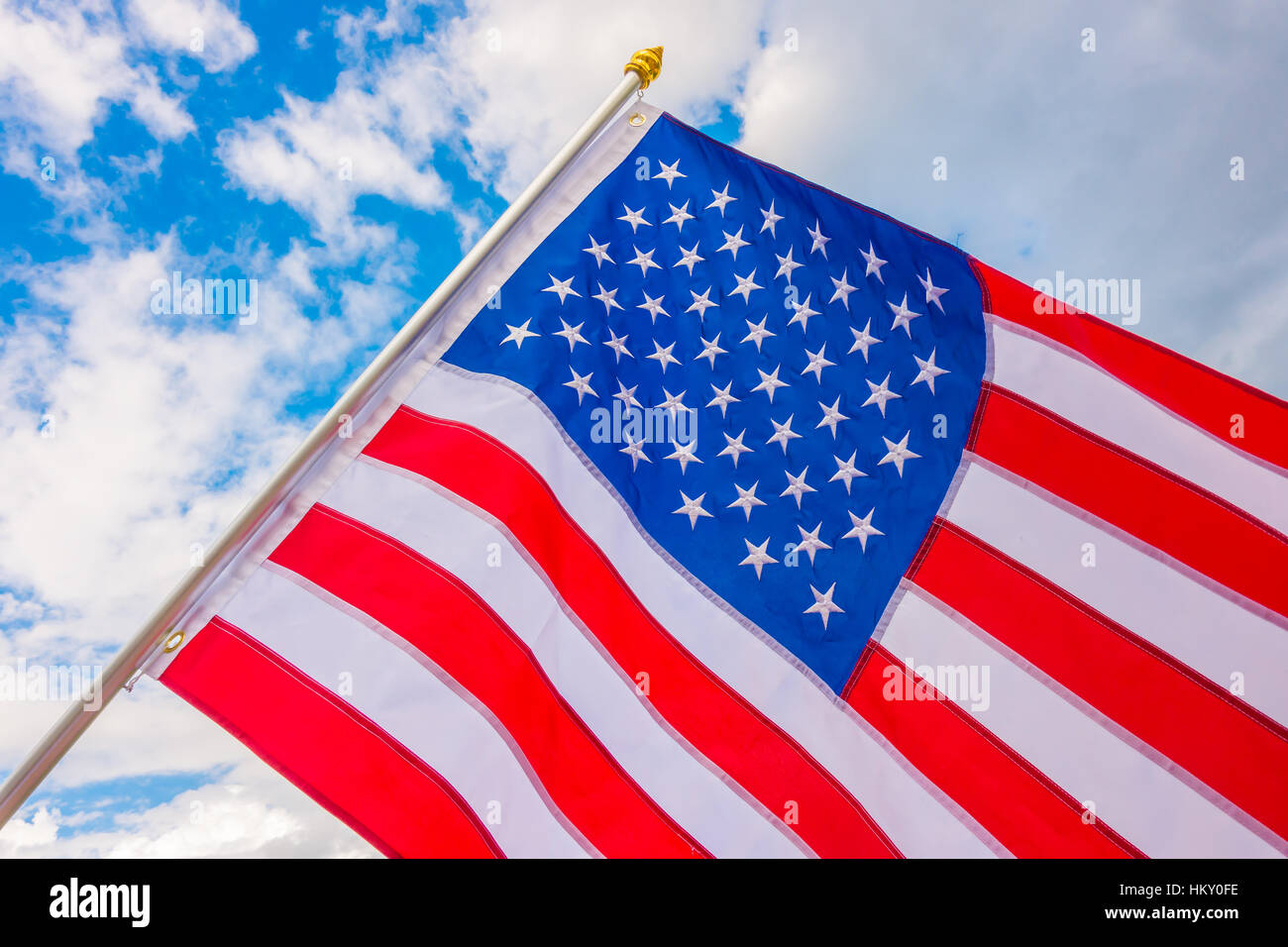 American flag on blue sky Stock Photo - Alamy