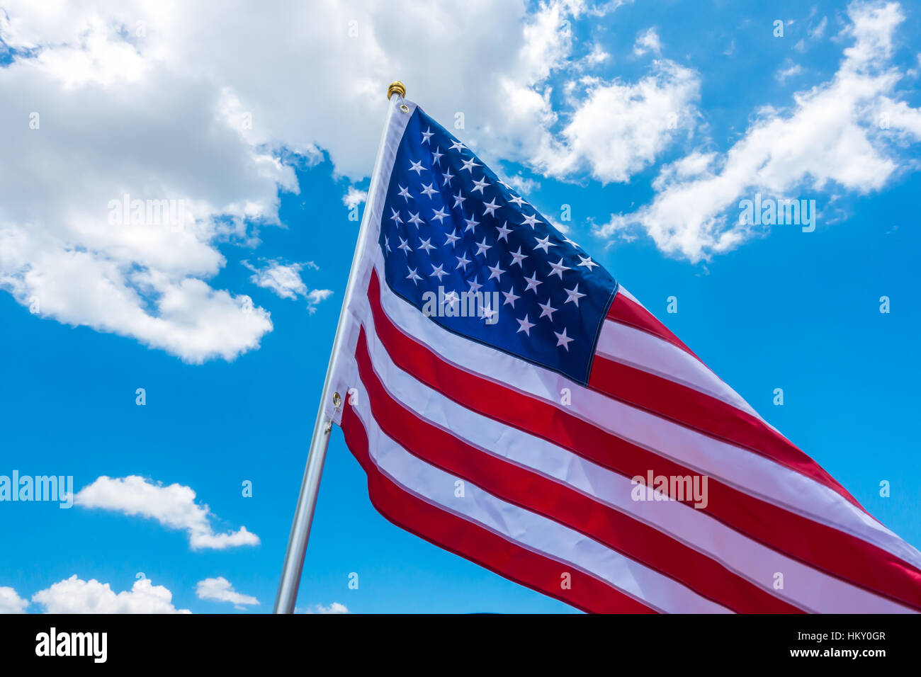 American flag on blue sky Stock Photo - Alamy