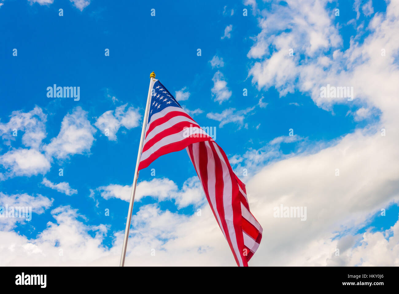 American flag on blue sky Stock Photo - Alamy