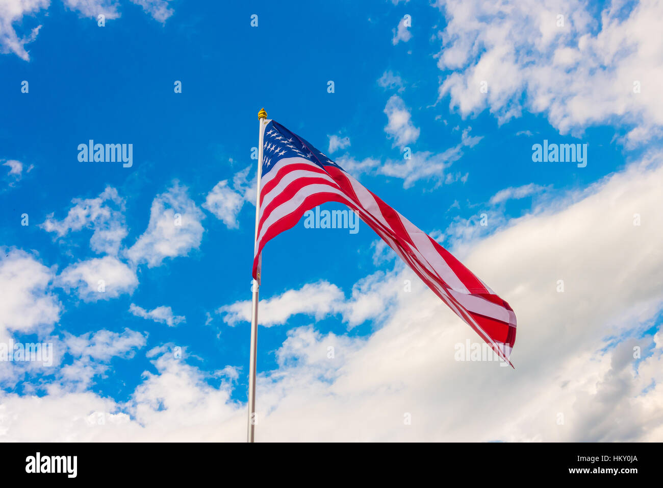 American flag on blue sky Stock Photo - Alamy
