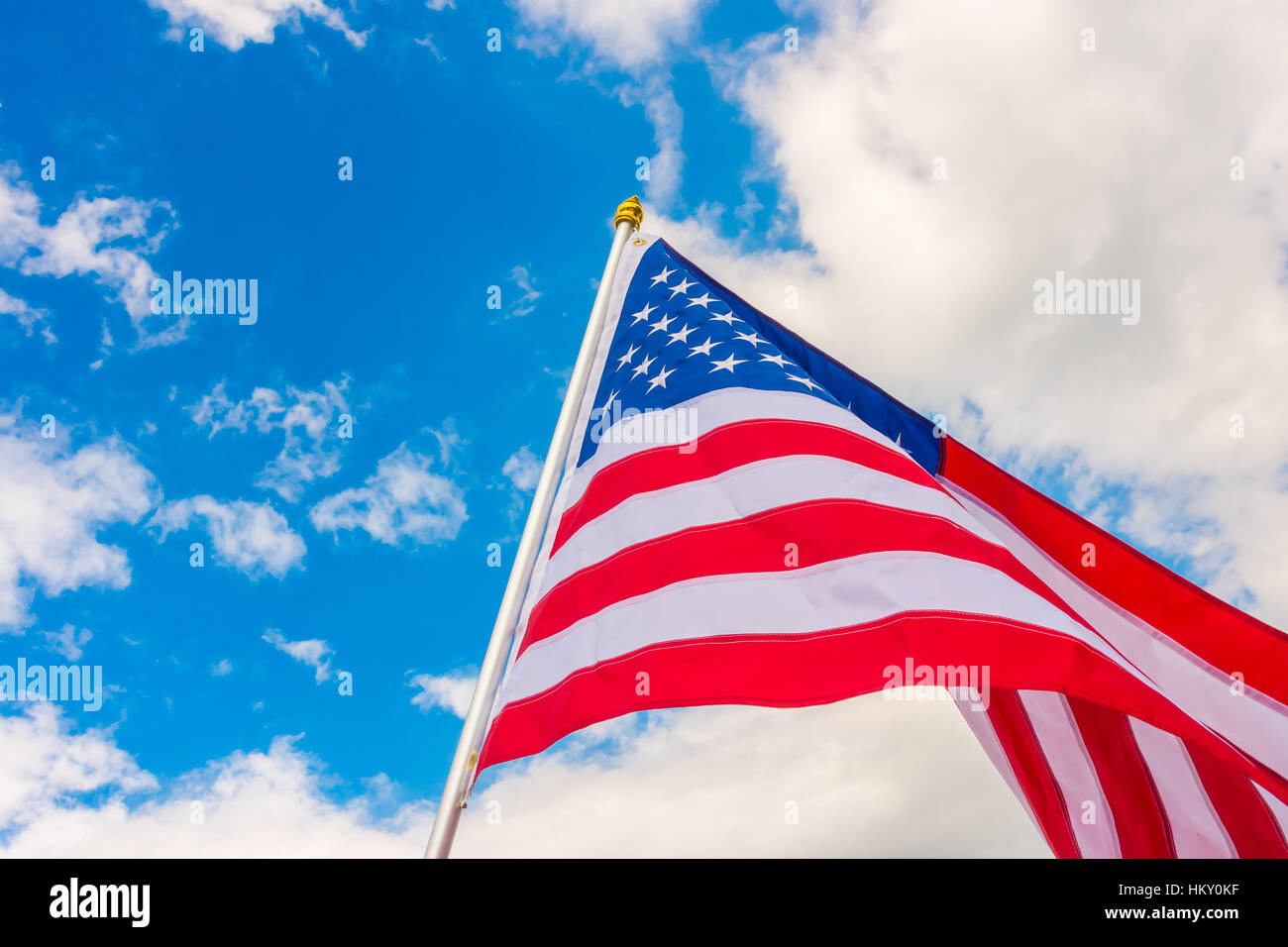 American flag on blue sky Stock Photo - Alamy