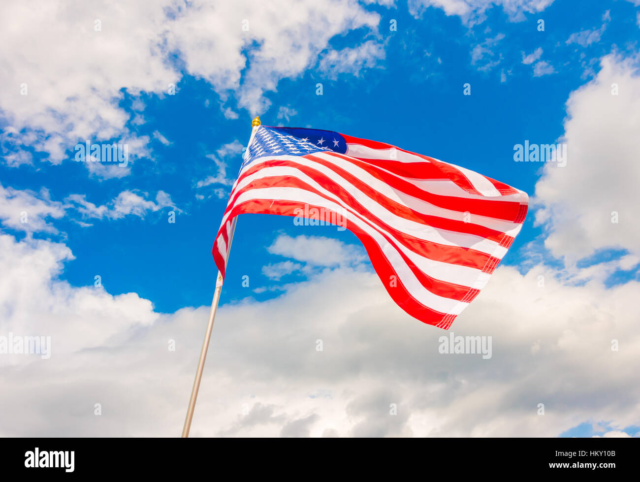 American flag on blue sky Stock Photo - Alamy