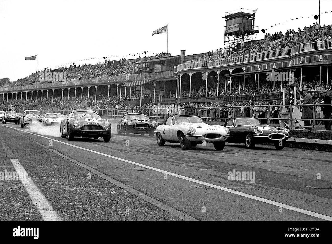 1961 Aston Martin DB4GT Zagato & Jaguar E-Types Start Aintree GP GG Stock Photo