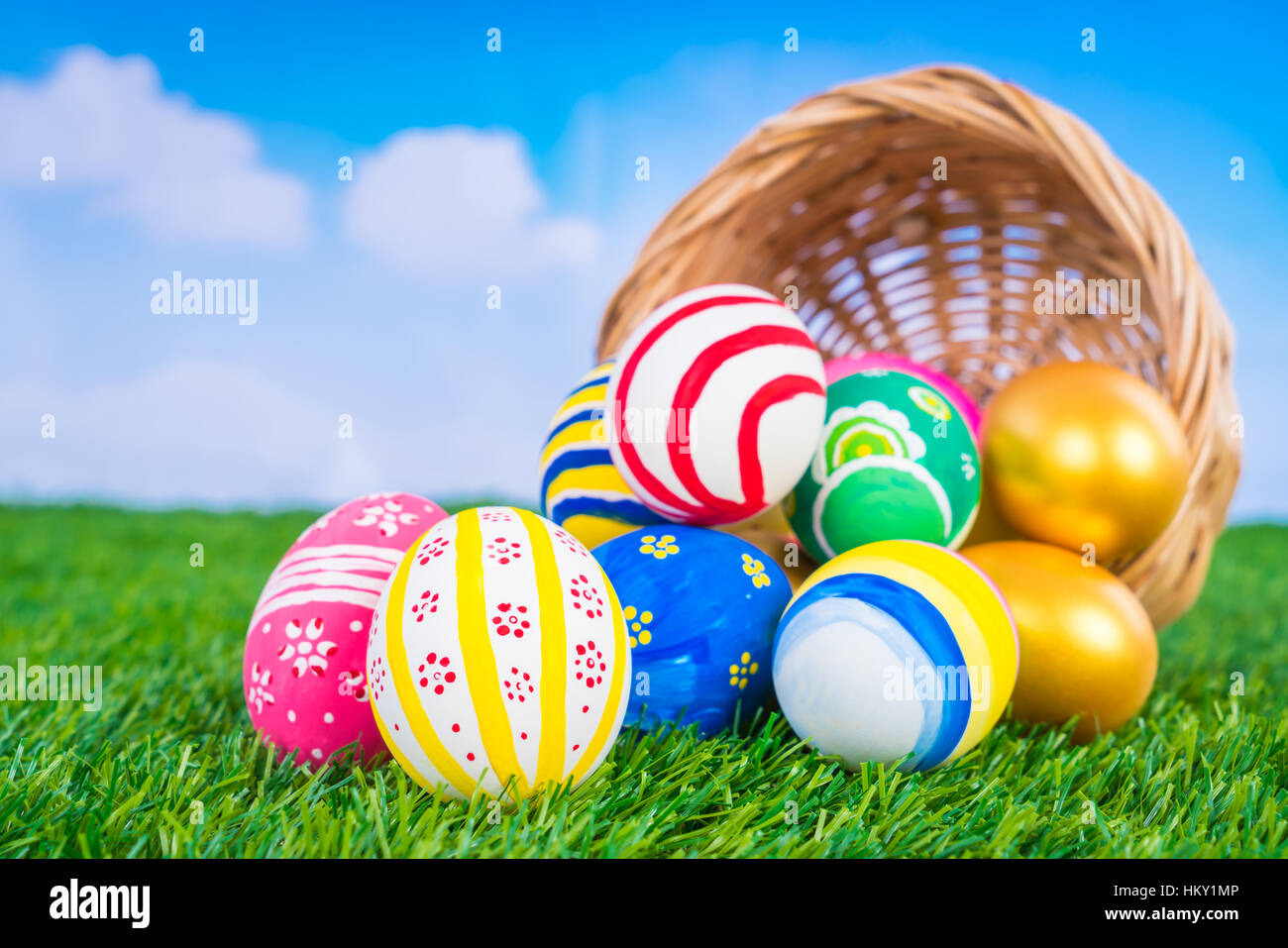 Easter Eggs on Fresh Green Grass over blue sky Stock Photo - Alamy
