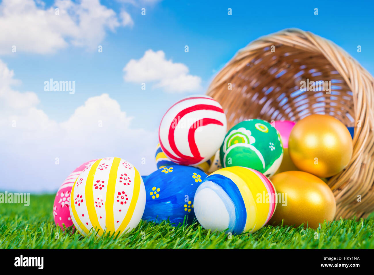 Easter Eggs on Fresh Green Grass over blue sky Stock Photo - Alamy