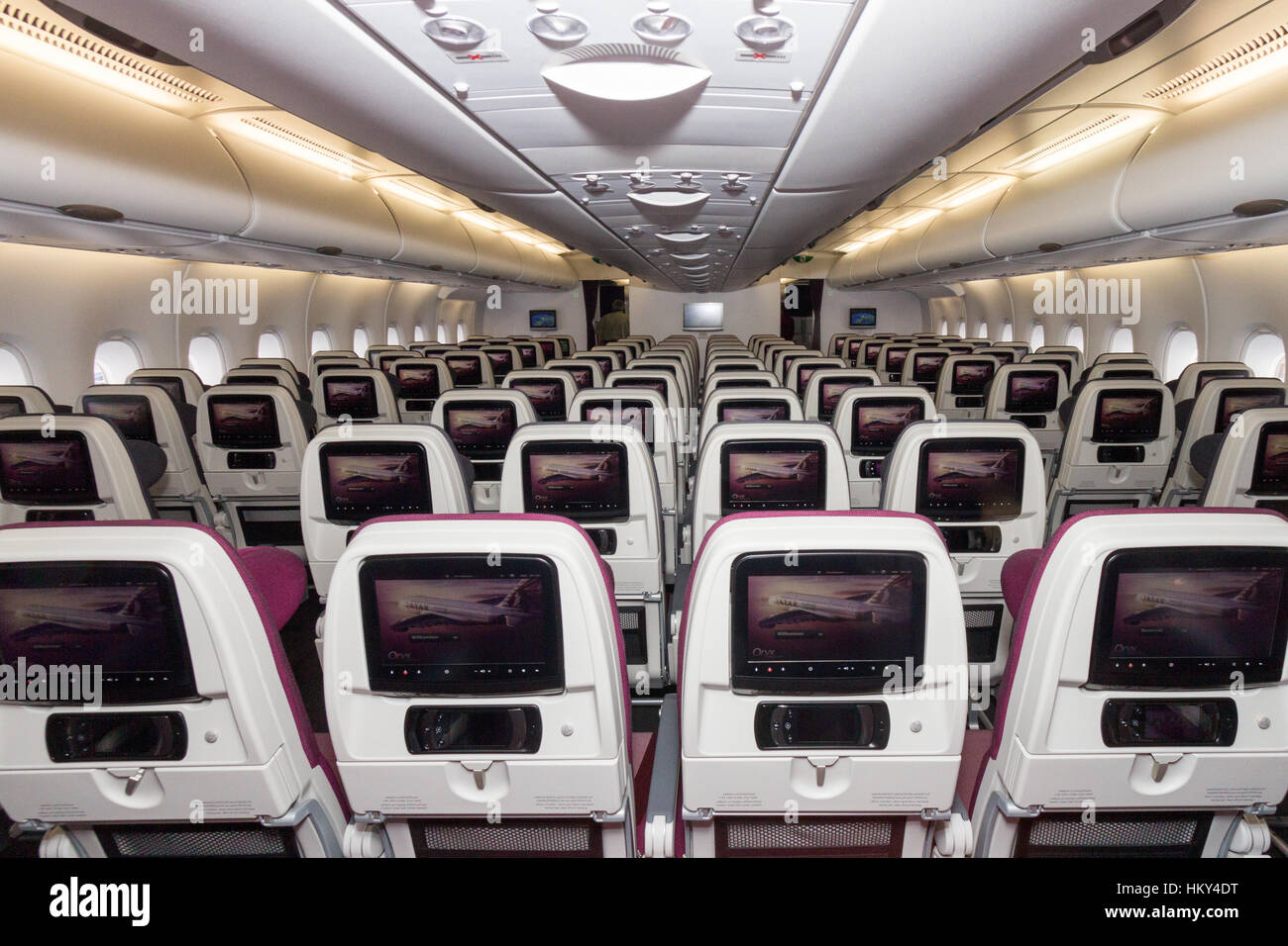 PARIS - JUN 18, 2015: Cabin view of a Qatar Airways Airbus A380. The A380 is the largest passenger airliner in the world. Stock Photo