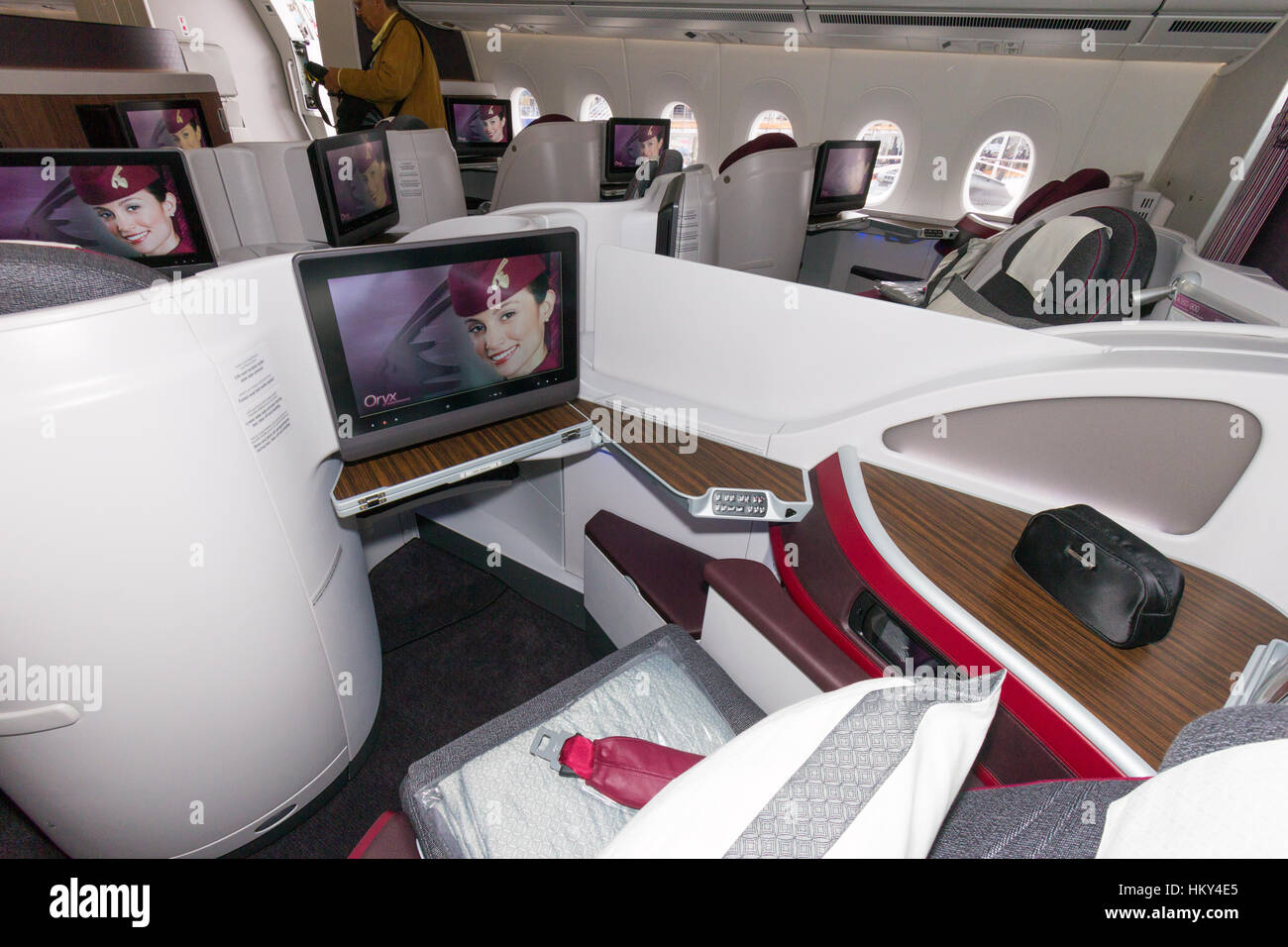 PARIS - JUN 18, 2015: First Class seat in a Qatar Airways Airbus A350. Qatar Airways is the first user of the A350 with it's first flight on 15 Januar Stock Photo