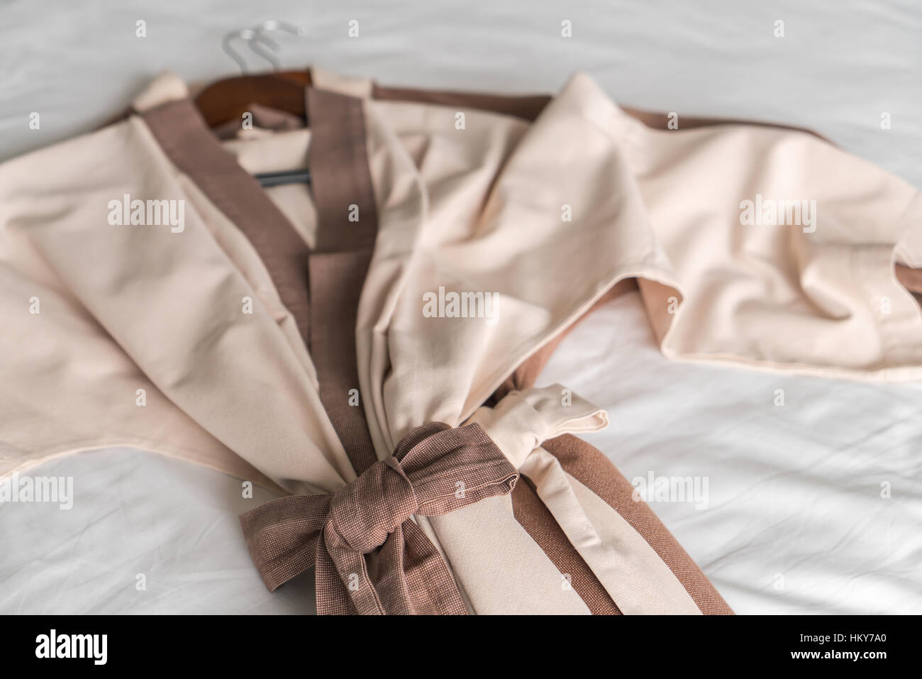 Clean bathrobe on bed Stock Photo Alamy