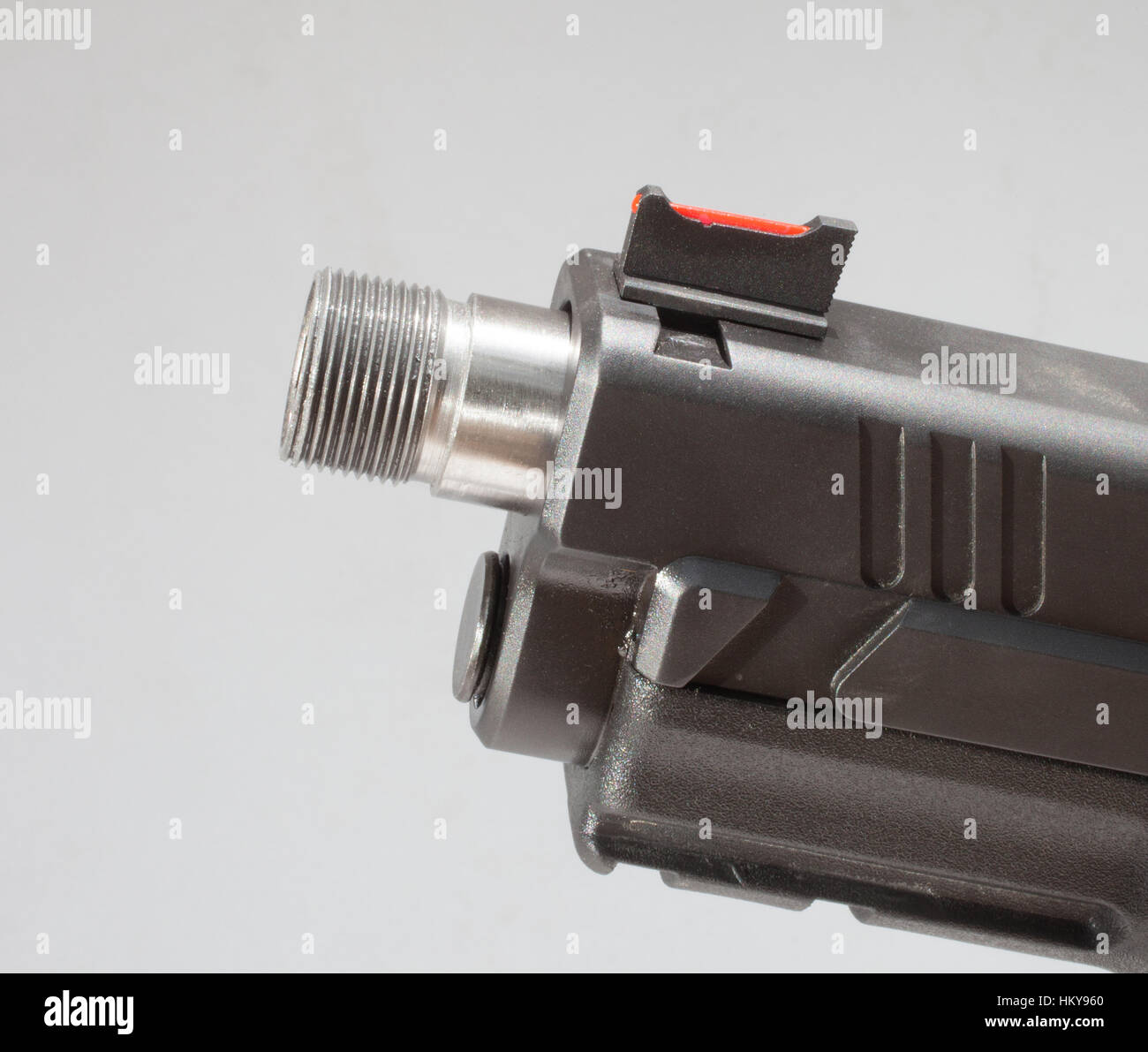 Handgun with a barrel that is threaded for a silencer Stock Photo - Alamy