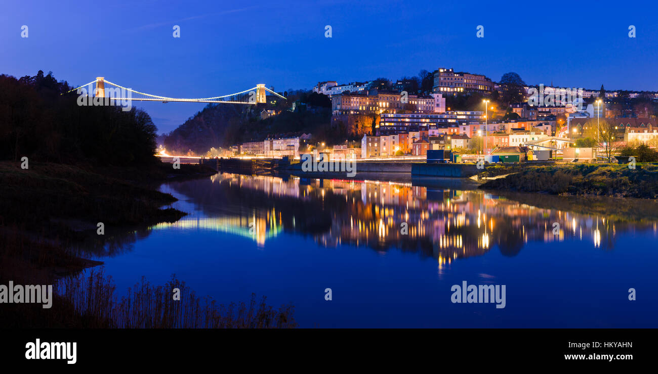 Bristol skyline at dusk with Clifton Suspension Bridge over the River Avon England. Stock Photo