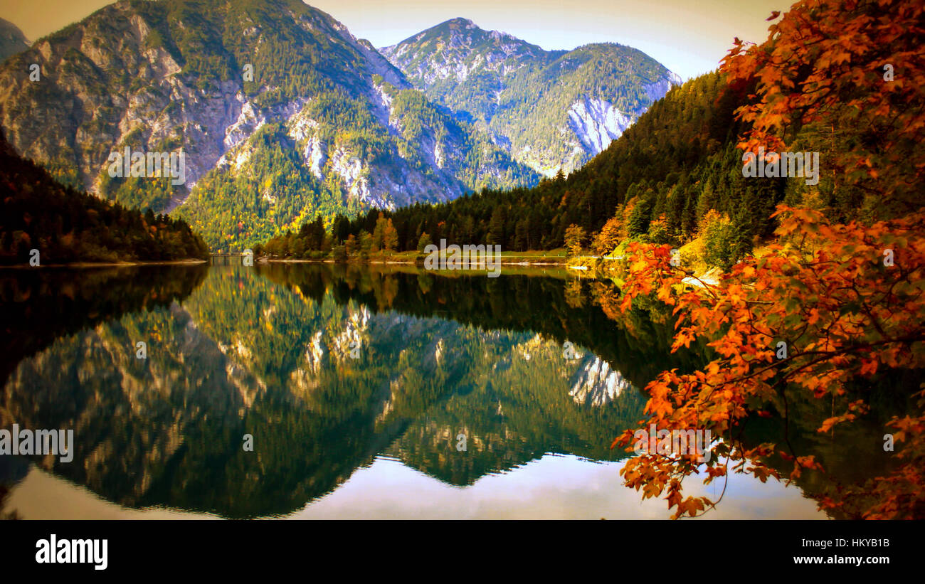 A mountain reflected in a clear lake Stock Photo