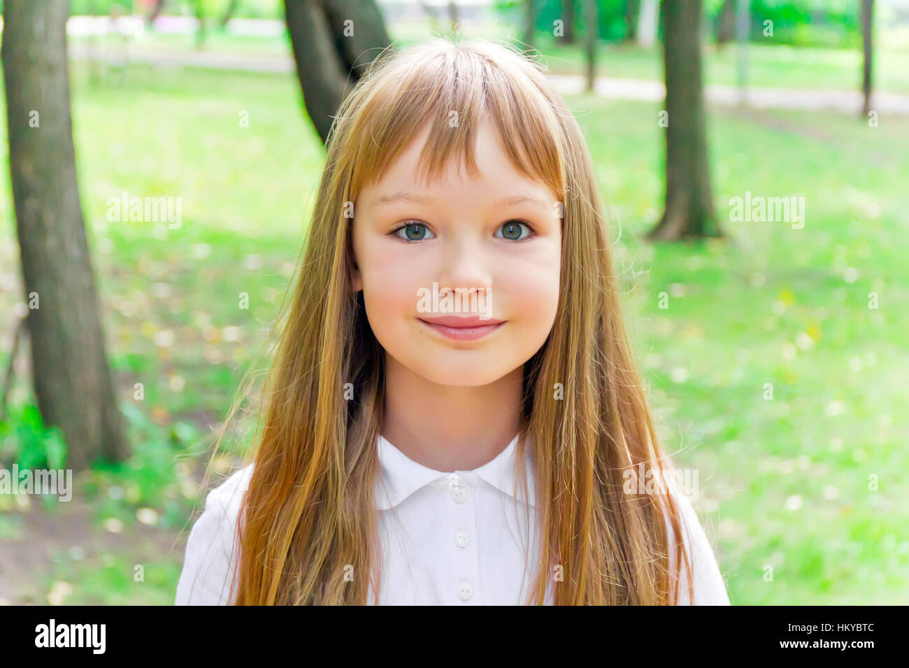Photo of cute girl with long hair Stock Photo - Alamy