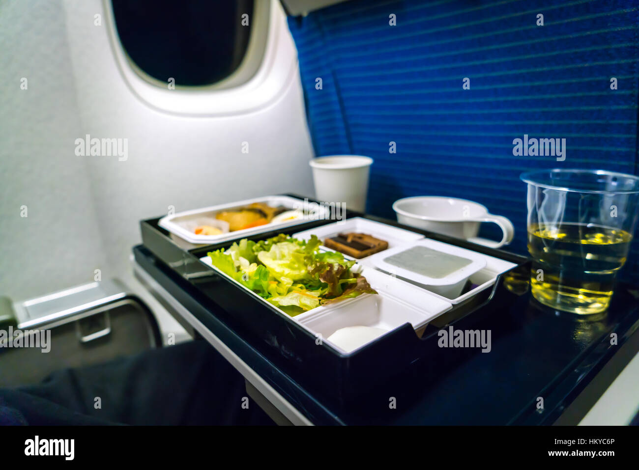 Tray of food on plane Stock Photo