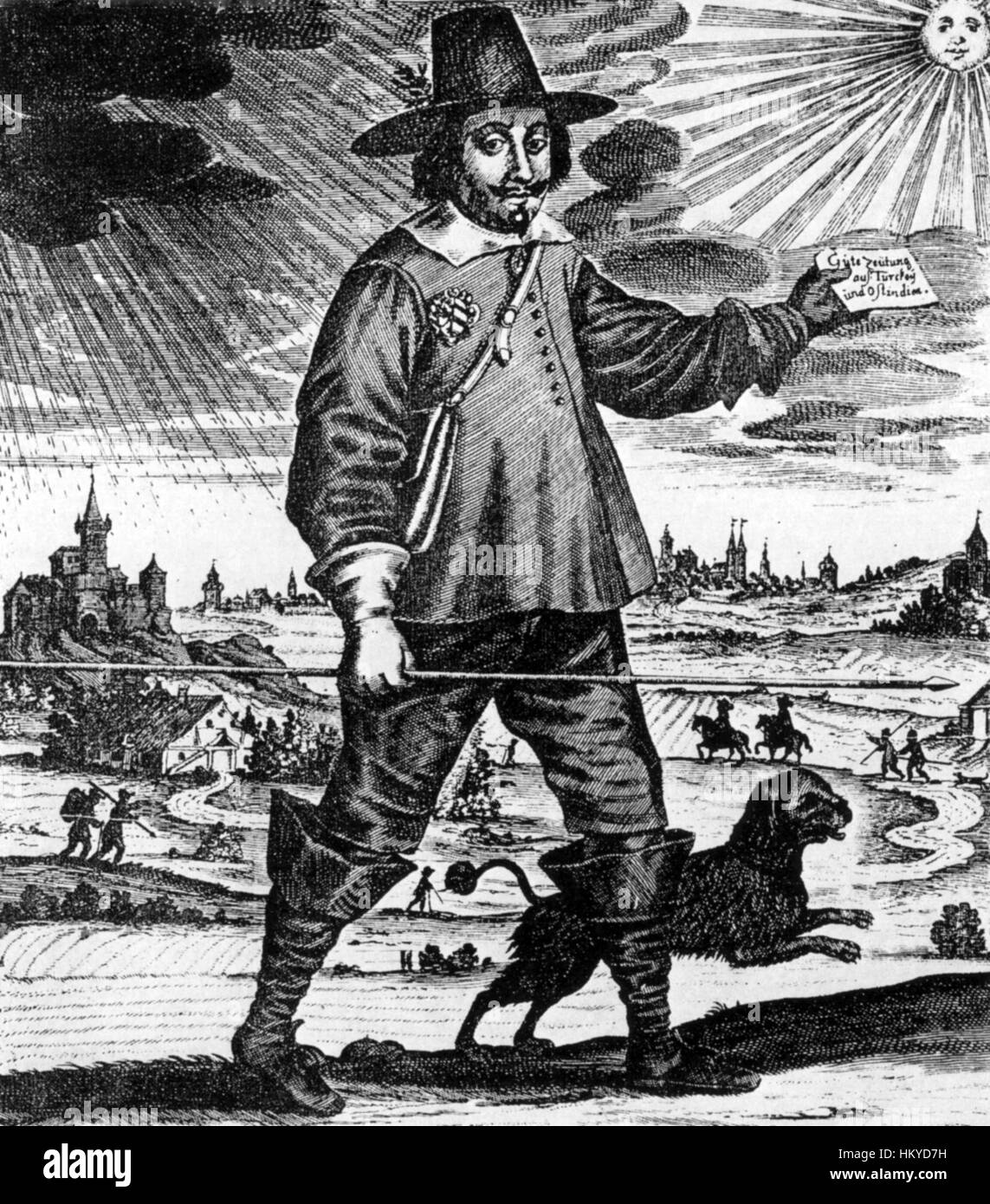 GERMAN POSTMAN employed by Nuremberg in the mid-17th century carrying his wand of office and holding a paper saying 'Good news from Turkey and India'. The city of Nuremberg is shown in e right hand background. Stock Photo