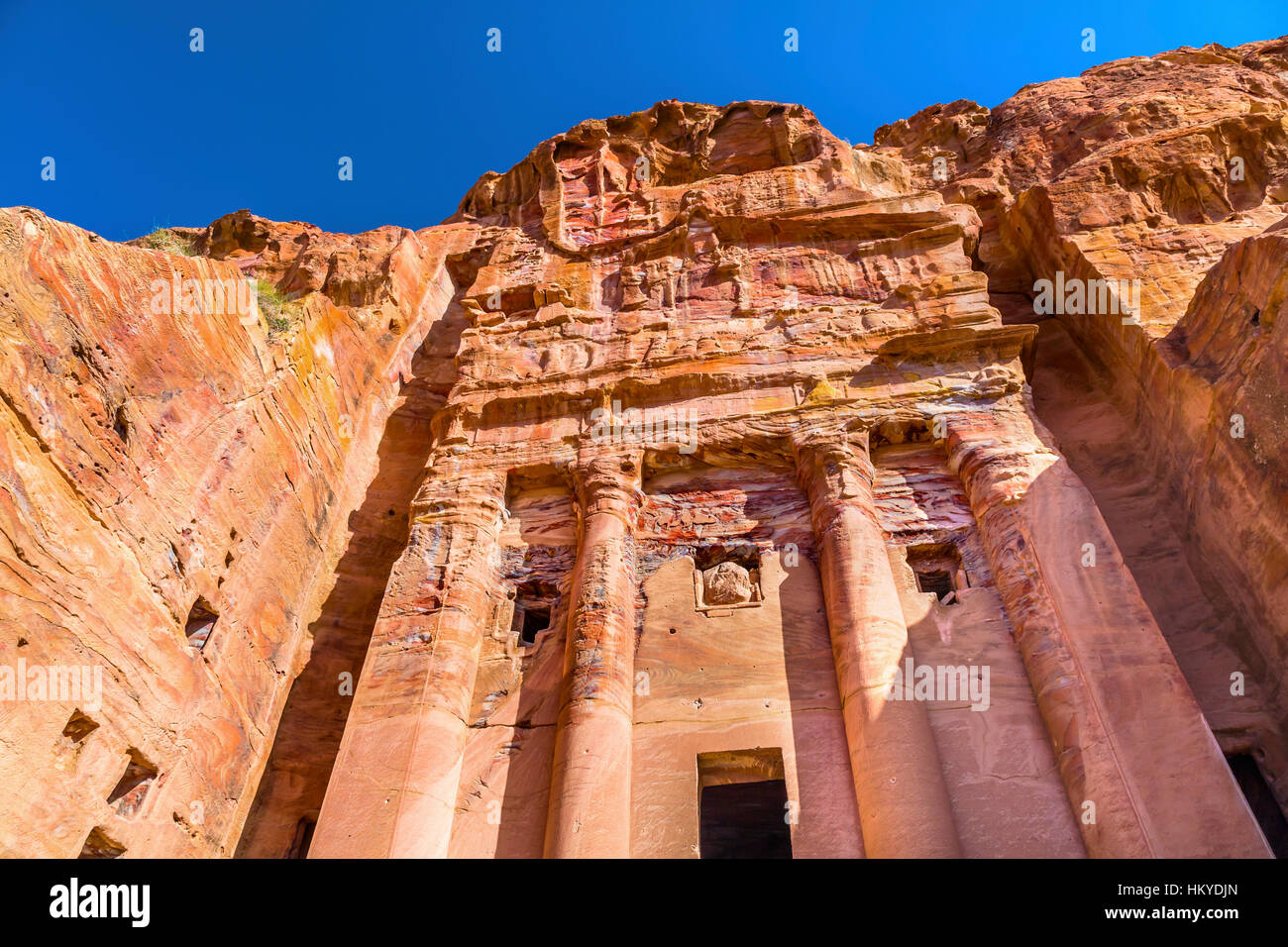 Royal Rock Tomb Arch Petra Jordan. Built by the Nabataens in 200 BC to 400 AD. Inside the Tombs, the red, orange, white, blue of the ceilings Stock Photo