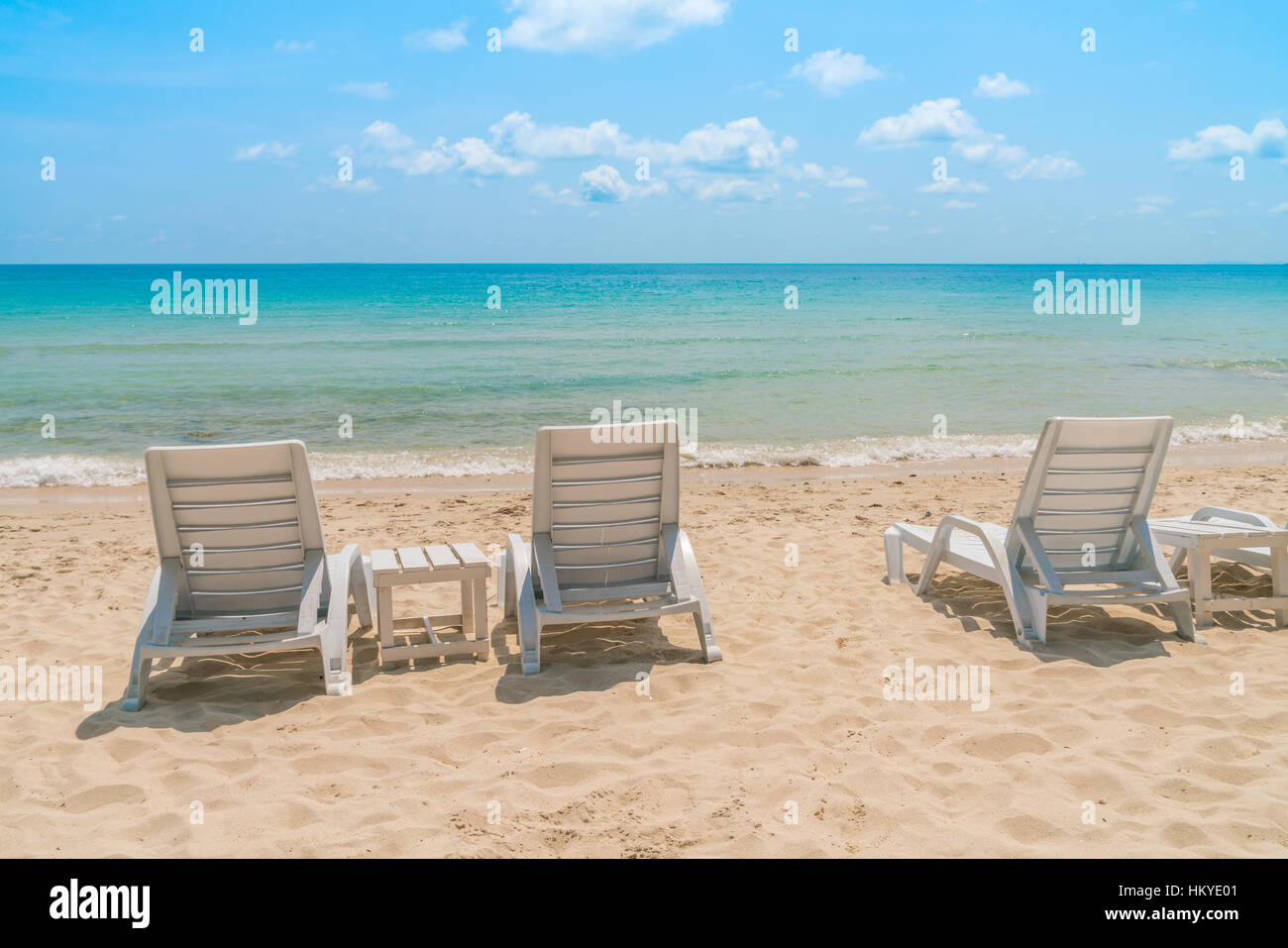 Beach chairs on tropical white sand beach Stock Photo - Alamy