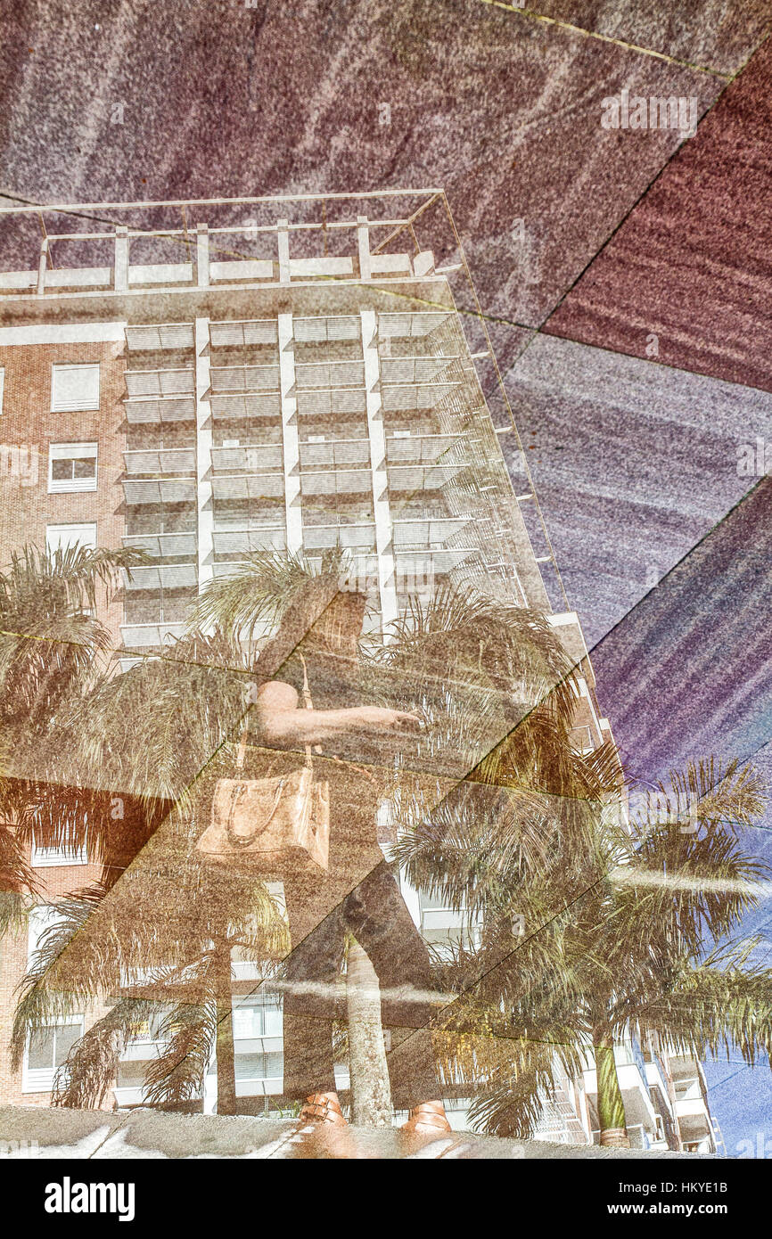 Reflex of a woman and a building at Cidade Pedra Branca. Palhoca, Santa Catarina, Brazil. Stock Photo