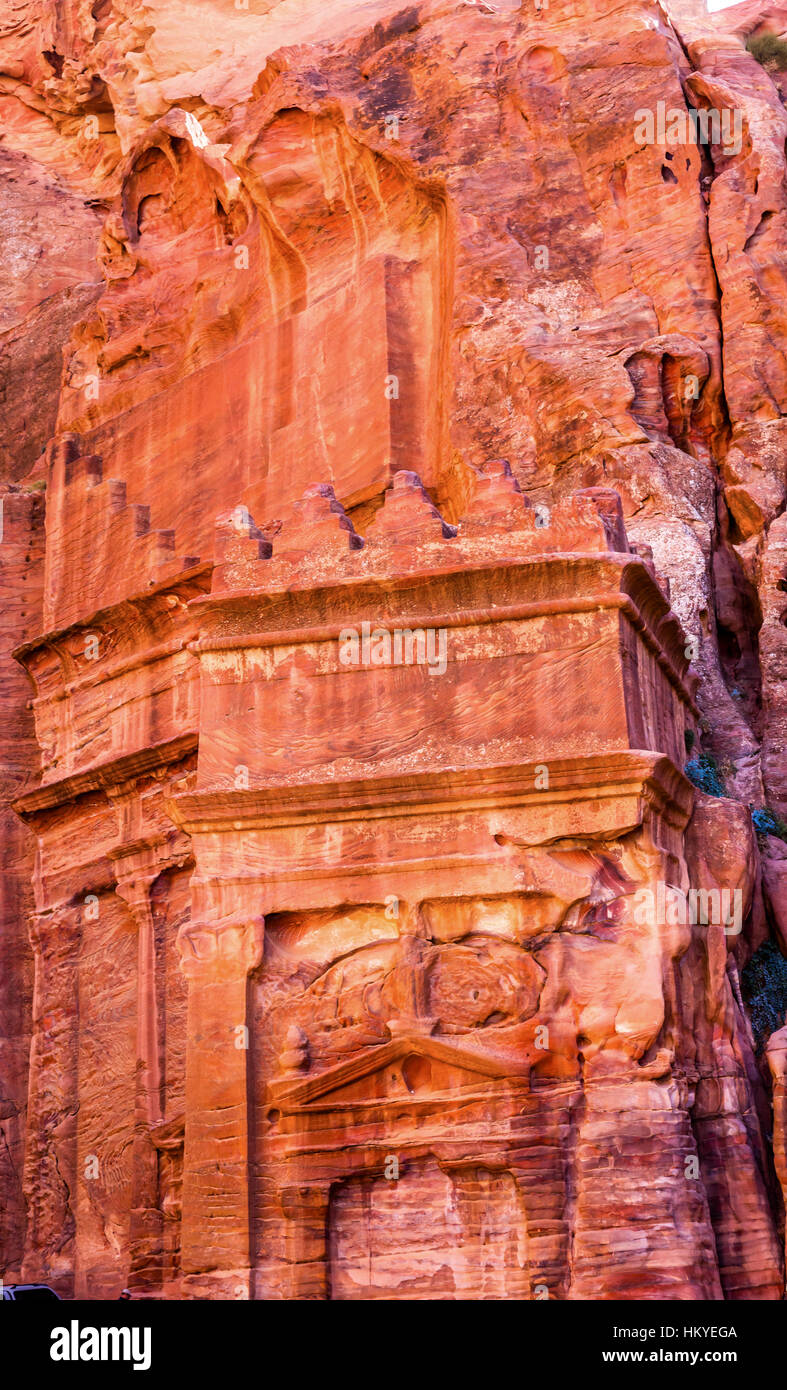 Rose Red Yellow Rock Tomb Street of Facades Petra Jordan.  Built by the Nabataens in 200 BC to 400 AD.  Rose Red canyon walls create many abstracts Stock Photo