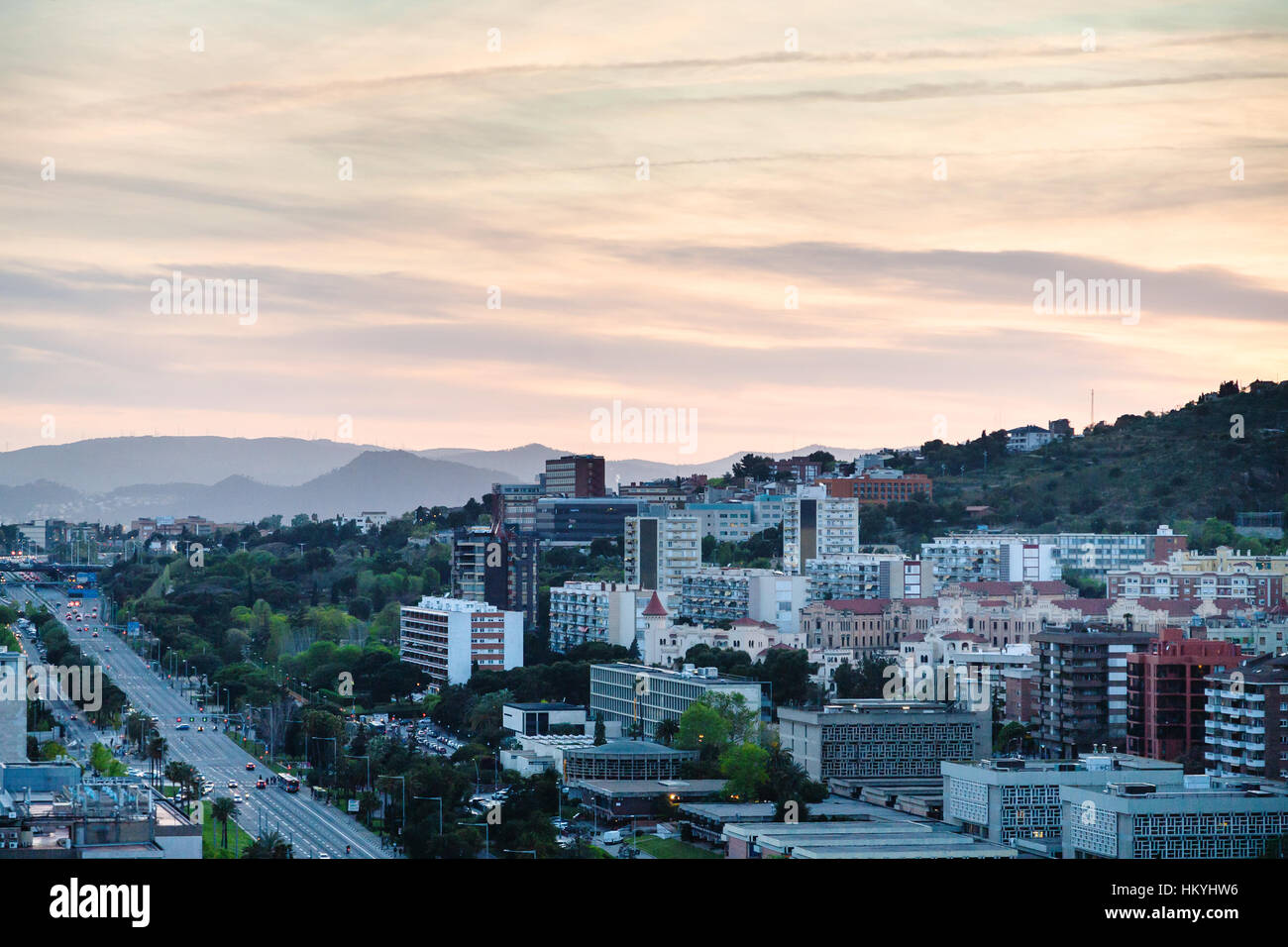 Sunset sky over of avenue Avinguda Diagonal in Barcelona city Stock Photo