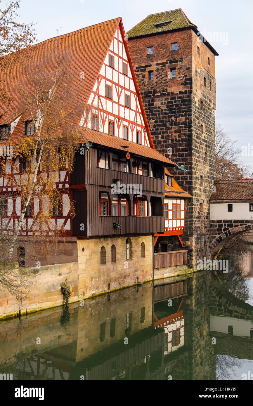 15th century Weinstadle timbered building beside Pegnitz River.  Nuremberg, Bavaria, Germany, Europe Stock Photo