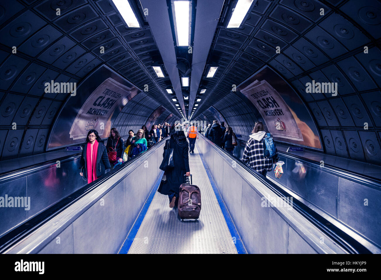 Passengers travel on London Underground tunnel Stock Photo