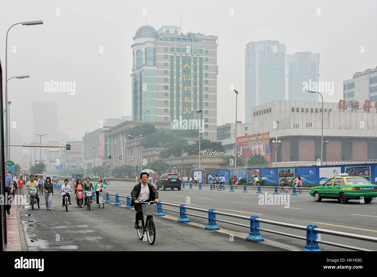 CHENGDU, CHINA - SEPTEMBER 16: Special line for bicyles, pedicabs on the multilane road on September 16, 2006 in Chengdu, Sichuan, China Stock Photo