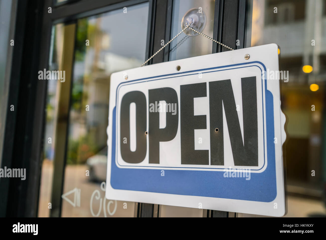 Open sign on a glass door Stock Photo - Alamy