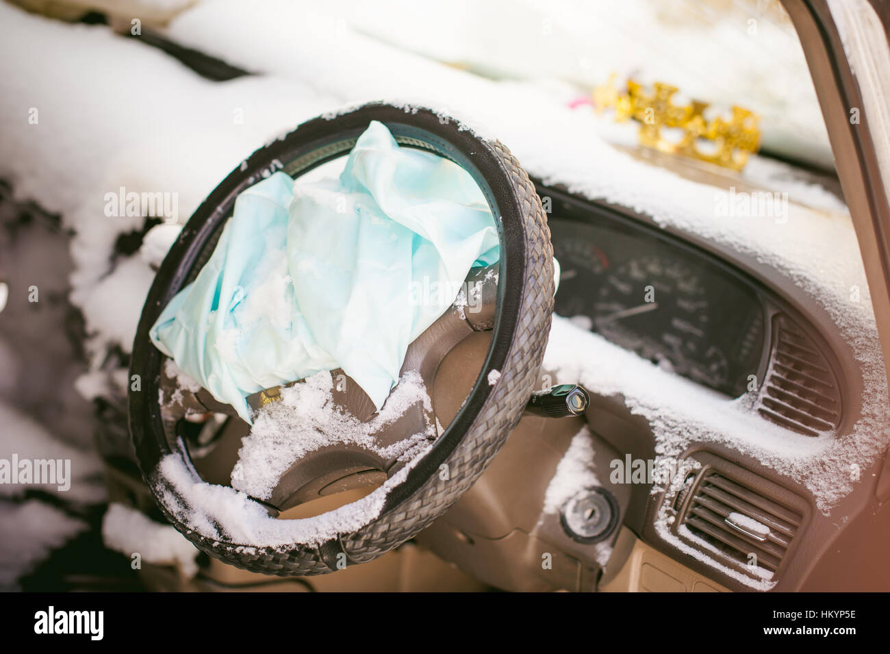 accident automobile. Salon crashed car covered with snow. Supplemental Restraint System Stock Photo