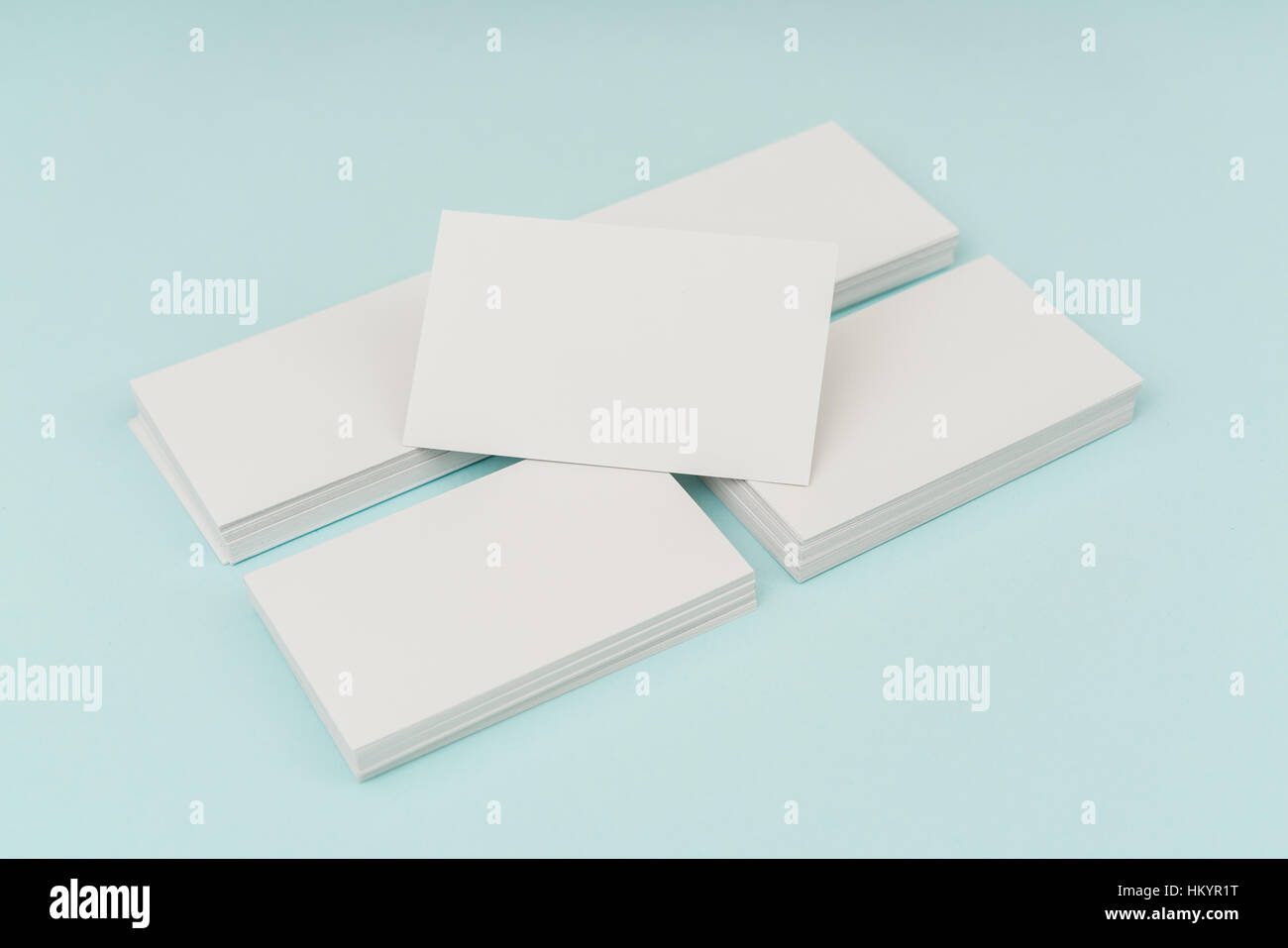 Blank business card on blue background Stock Photo - Alamy