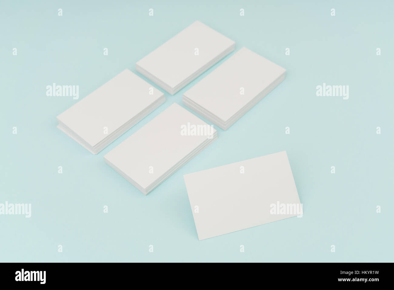 Blank business card on blue background Stock Photo - Alamy