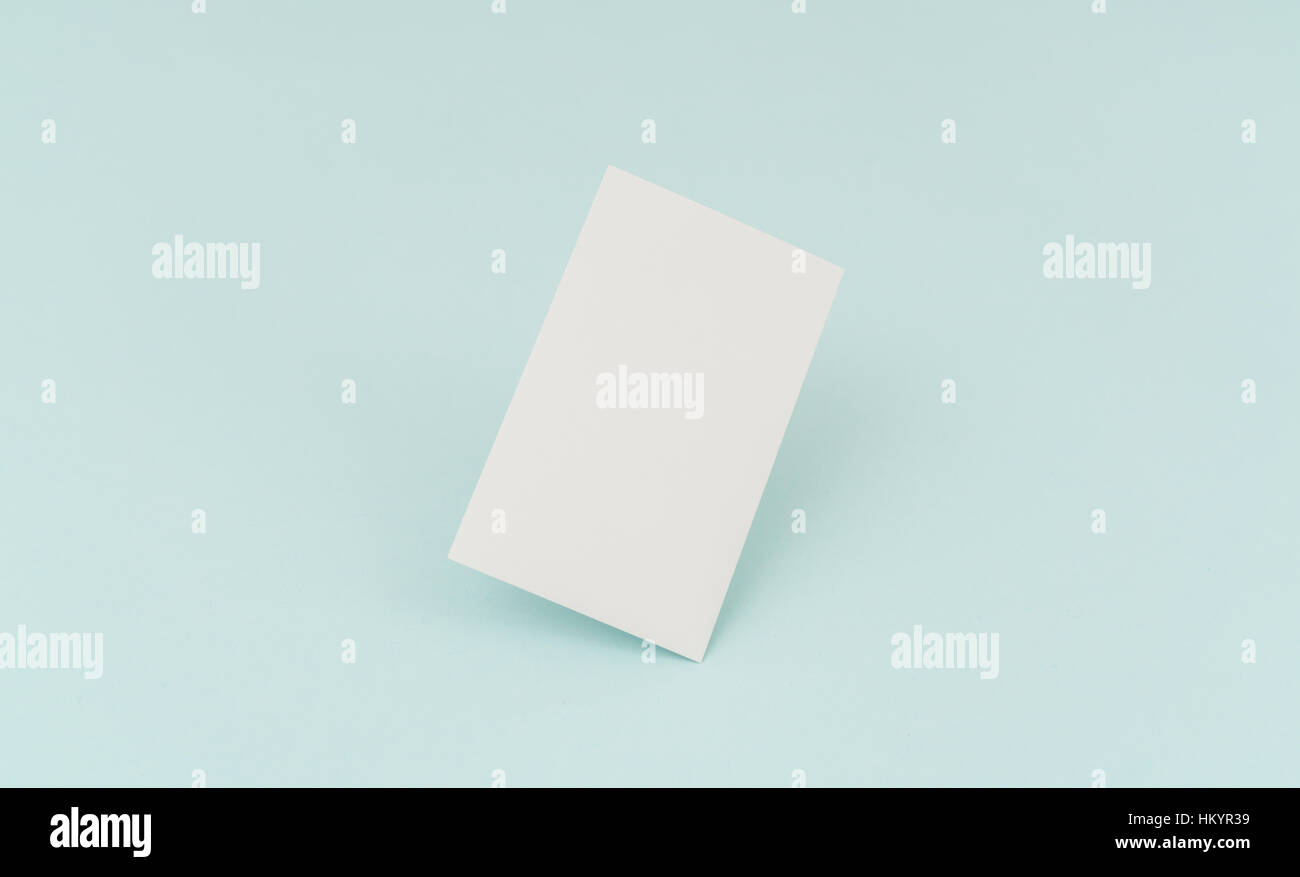 Blank business card on blue background Stock Photo - Alamy