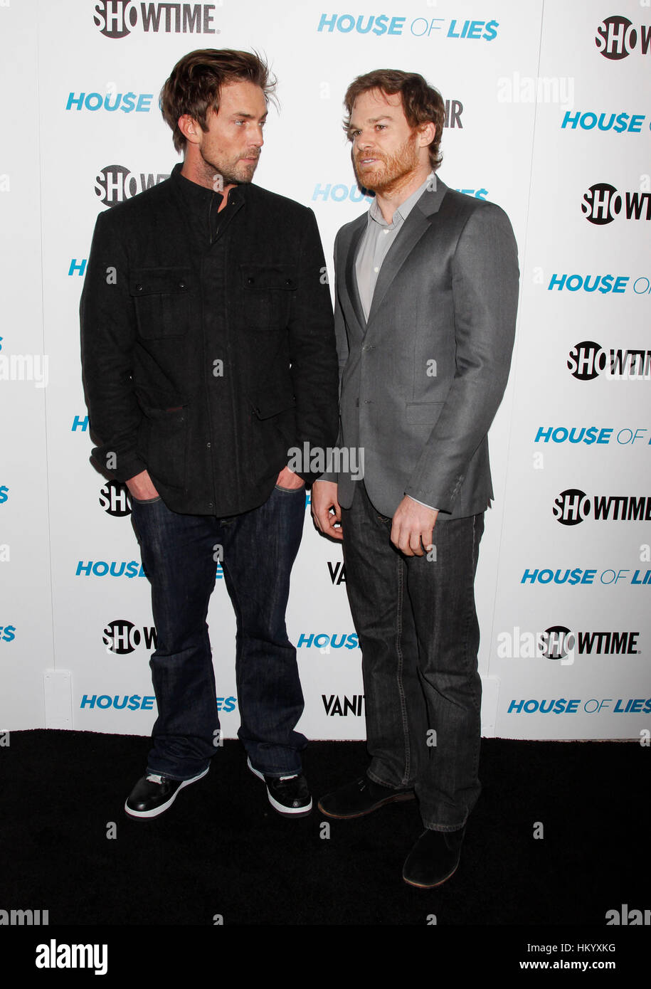 Michael C. Hall, right, and Desmond Harrington arrive at the Showtime Premiere Party and Screening of House of Lies in Los Angeles, California on January, 4, 2012. Photo by Francis Specker Stock Photo