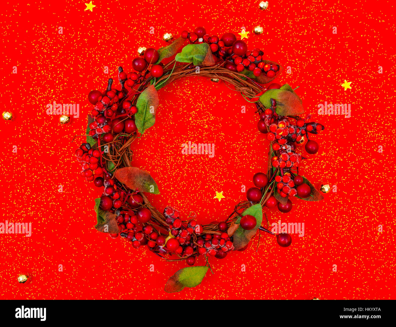 Christmas wreath on red background Stock Photo - Alamy
