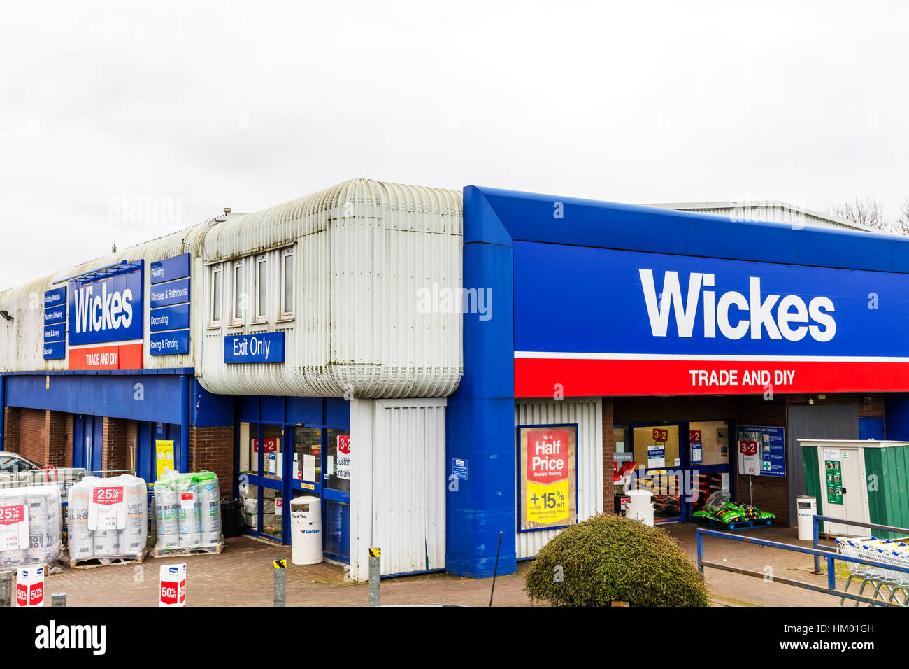 Wickes DIY trade store shop building exterior emblem sign signs UK England  stores shops do it yourself building supplies Stock Photo - Alamy