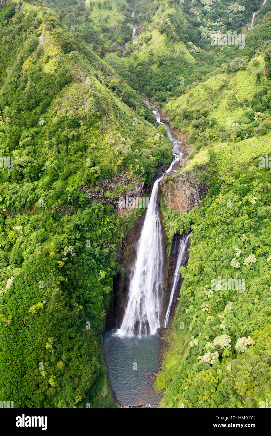 Aerial view of the Manawaiopuna Falls also known as the Jurassic Falls in the moutains in Kauai, Hawaii, USA. Stock Photo