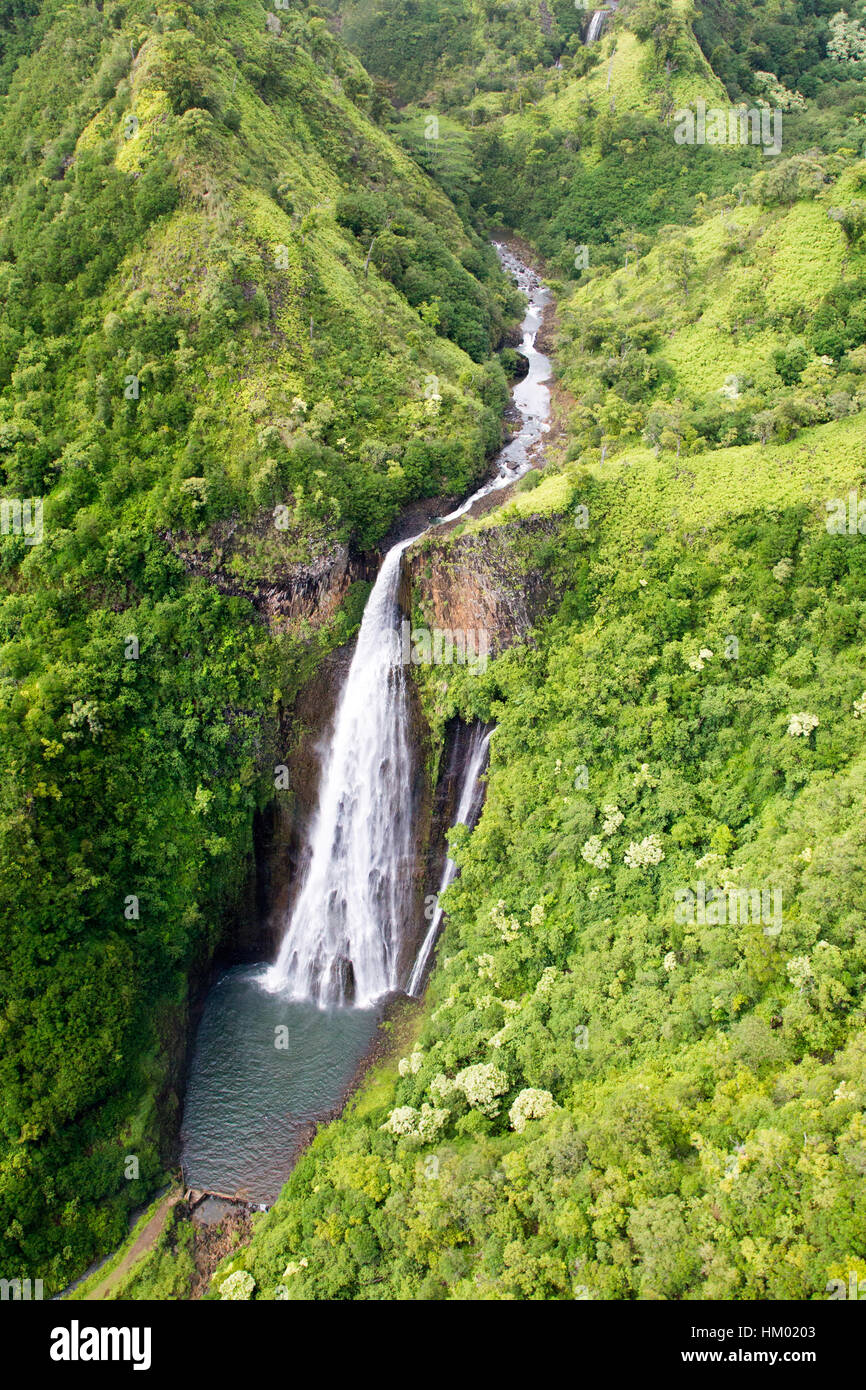 Aerial view of the Manawaiopuna Falls also known as the Jurassic Falls in the moutains in Kauai, Hawaii, USA. Stock Photo