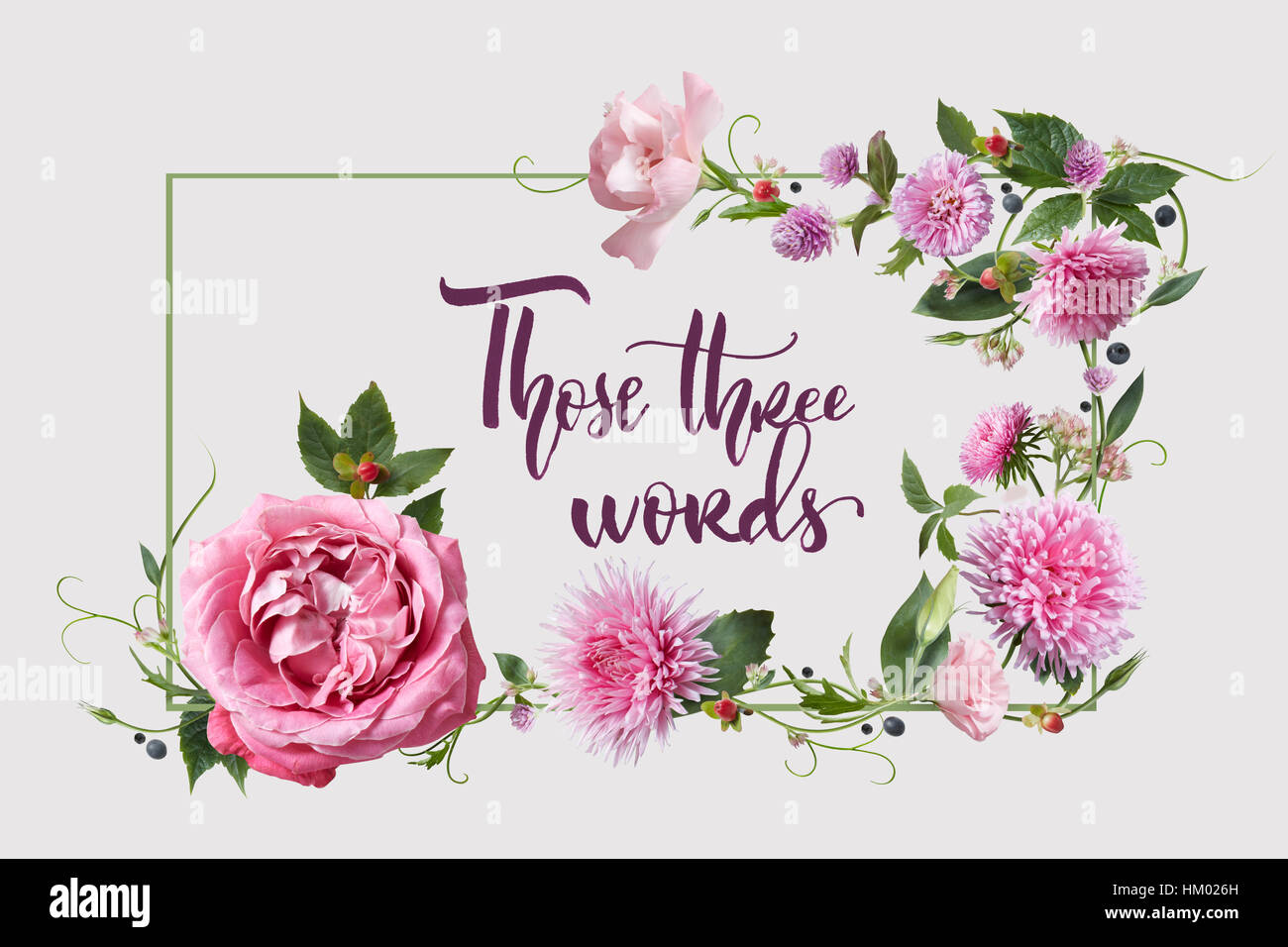 Beautiful greeting card with flowers and the words calligraphy Those three words Stock Photo