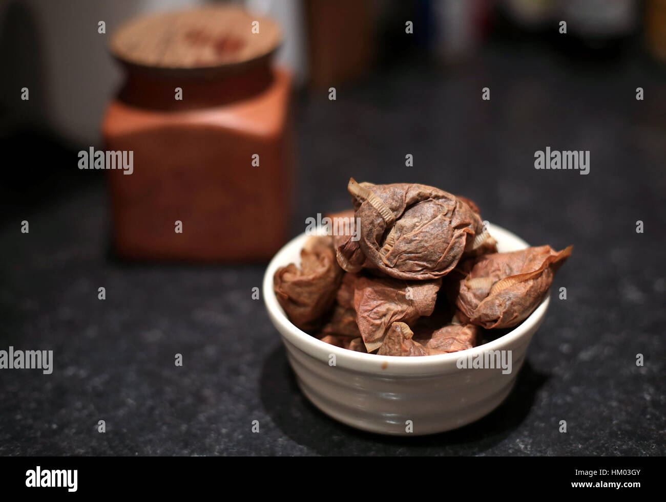 A pile of used teabags waiting to be thrown into a food recycling bin, in a kitchen in north London. PRESS ASSOCIATION Photo. Picture date: Sunday January 29, 2017. Photo credit should read: Yui Mok/PA Wire Stock Photo