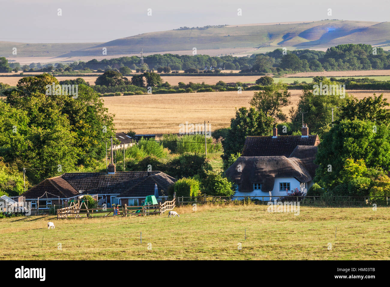 View over the Vale of Pewsey looking towards the Alton Barnes white horse in Wiltshire, UK. Stock Photo