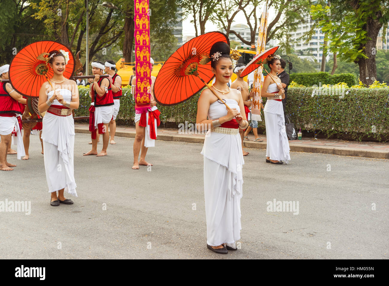Beautiful Chinese womans with dress traditional and red umbrellas on the Chinese new year. Stock Photo