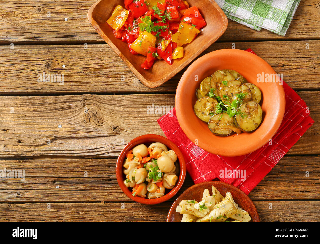 bowl of assorted pickled vegetables on wooden background Stock Photo