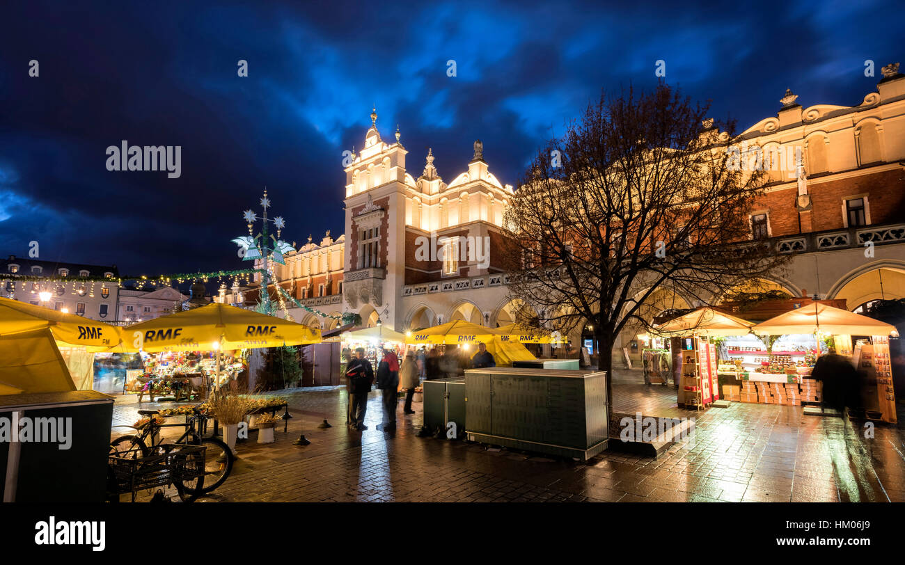 Christmas Markets at the Cloth Hall Krakow Crakow Poland at dusk Stock Photo