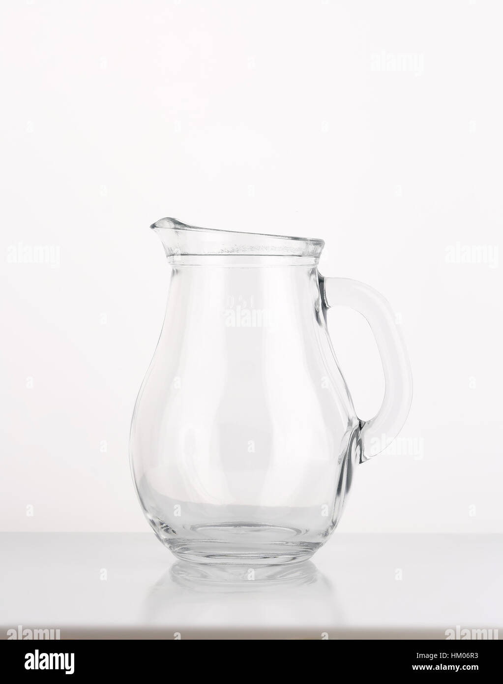 empty glass jug on white background Stock Photo Alamy