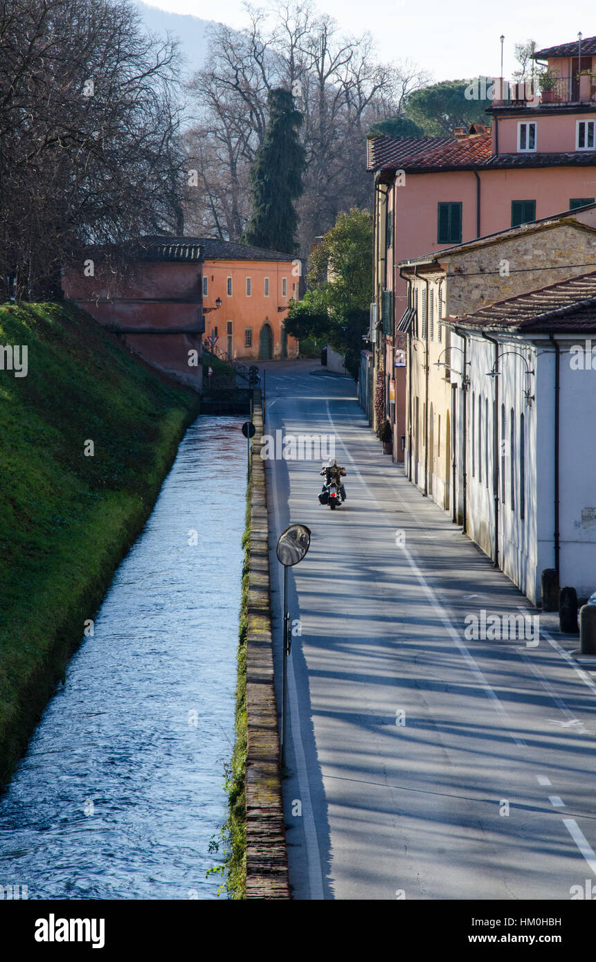 Lonesome rider in Lucca Stock Photo