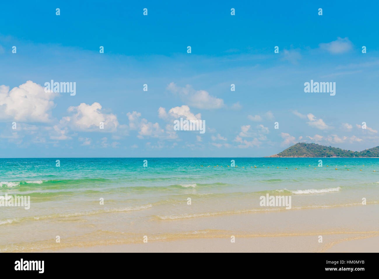 Beautiful white sand beach with blue sea and sky Stock Photo - Alamy