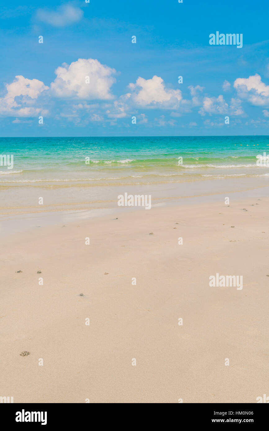 Beautiful white sand beach with blue sea and sky Stock Photo - Alamy