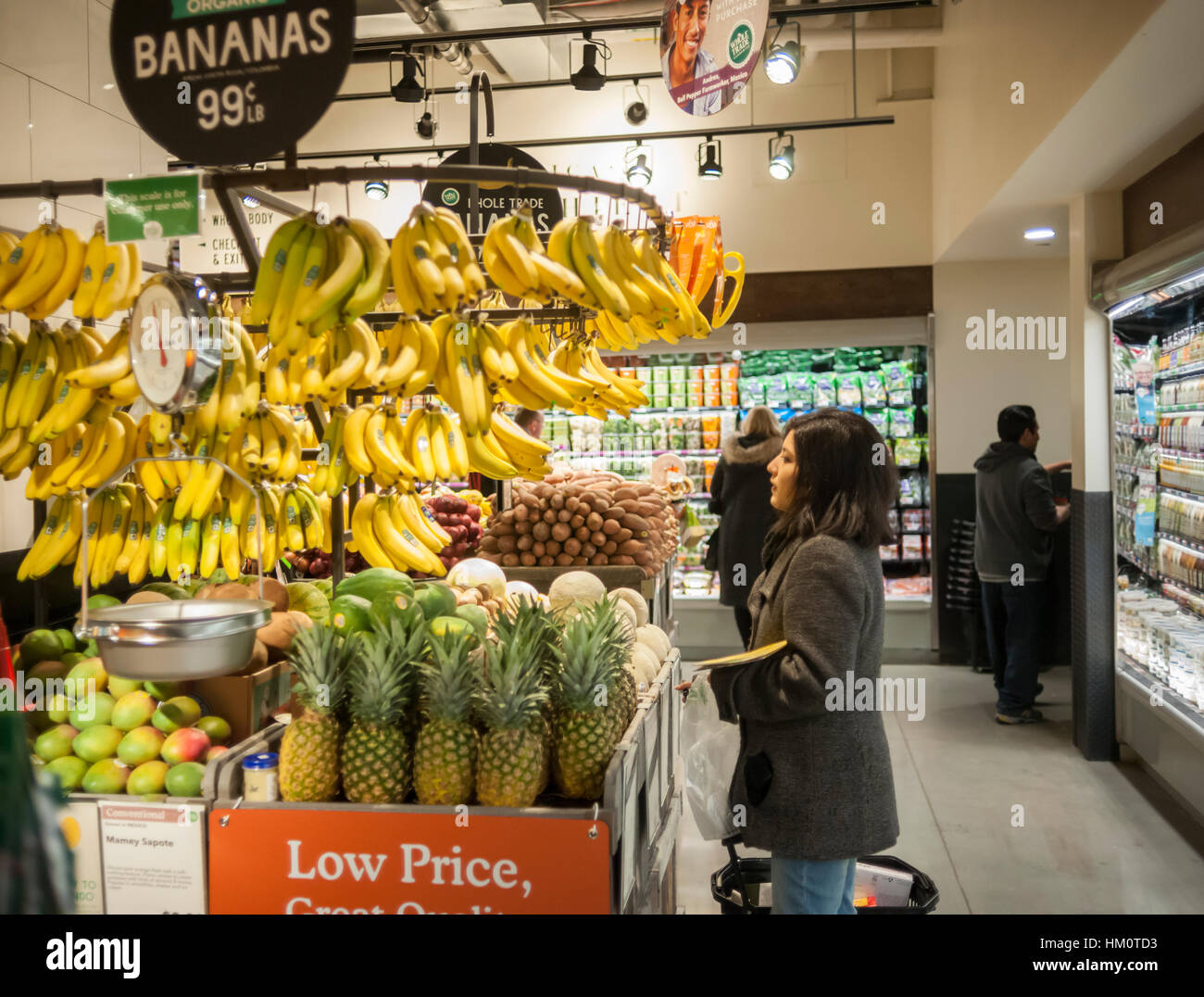 https://c8.alamy.com/comp/HM0TD3/banana-display-in-the-produce-department-in-the-new-whole-foods-market-HM0TD3.jpg