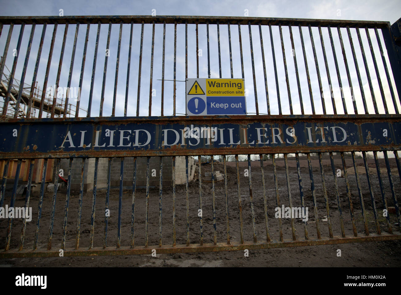 old allied distillers whiskey premises gates now a housebuilding site Stock Photo