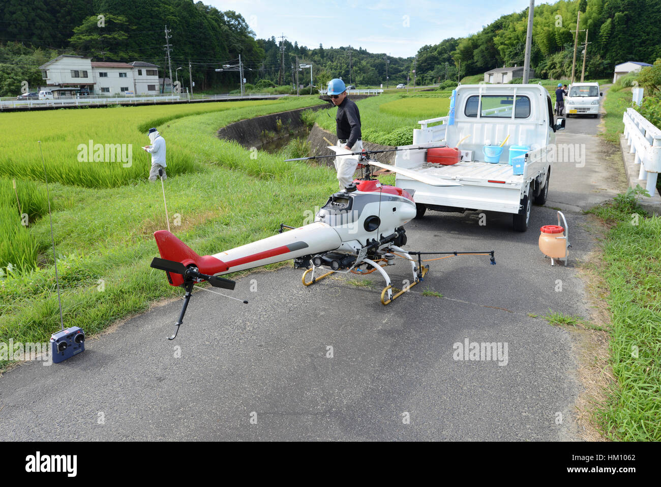 remotely-piloted  helicopter being refilled with petrol Stock Photo